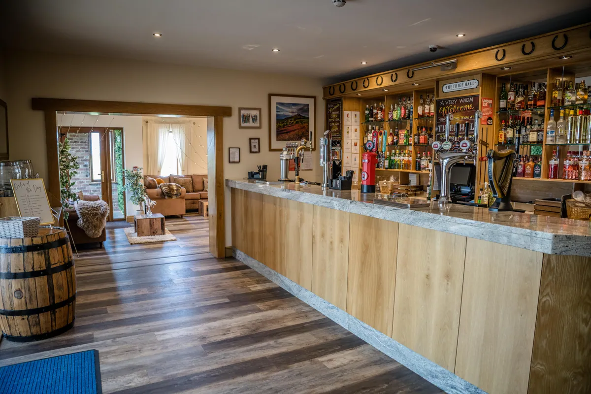 The doorway between the Thief Hall lounge and stocked bar