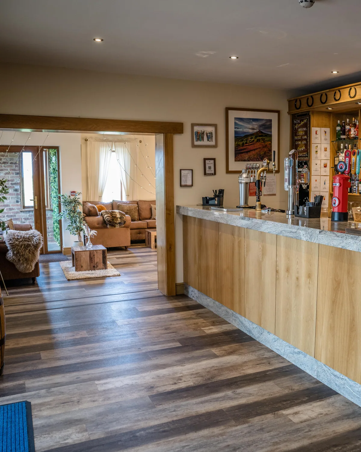 The Thief Hall bar with the adjoining lounge visible through the doorway