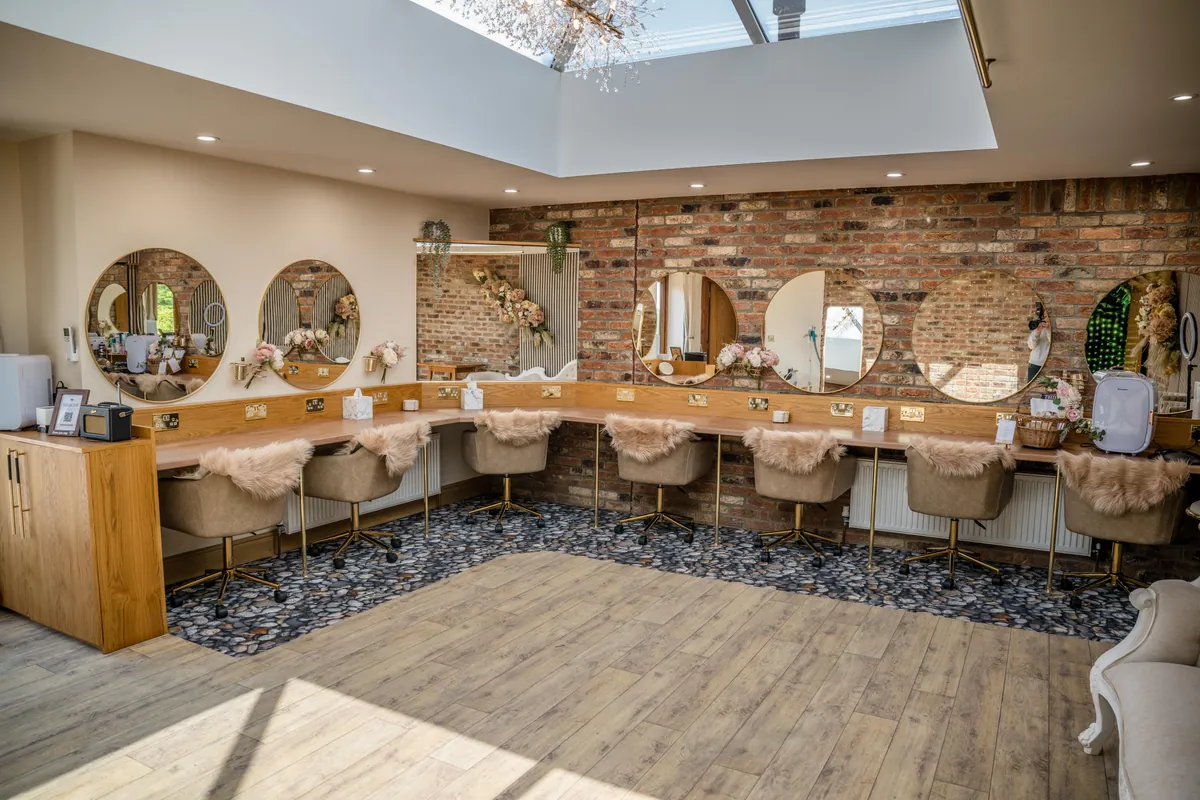 Vanity stations and mirrors in Bess's Bridle Suite at Thief Hall