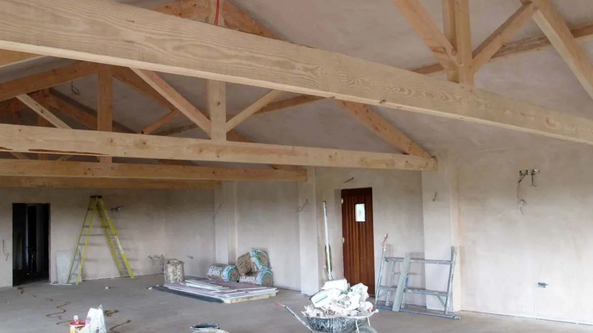 New timber roof beams inside Thief Hall while the walls were being finished